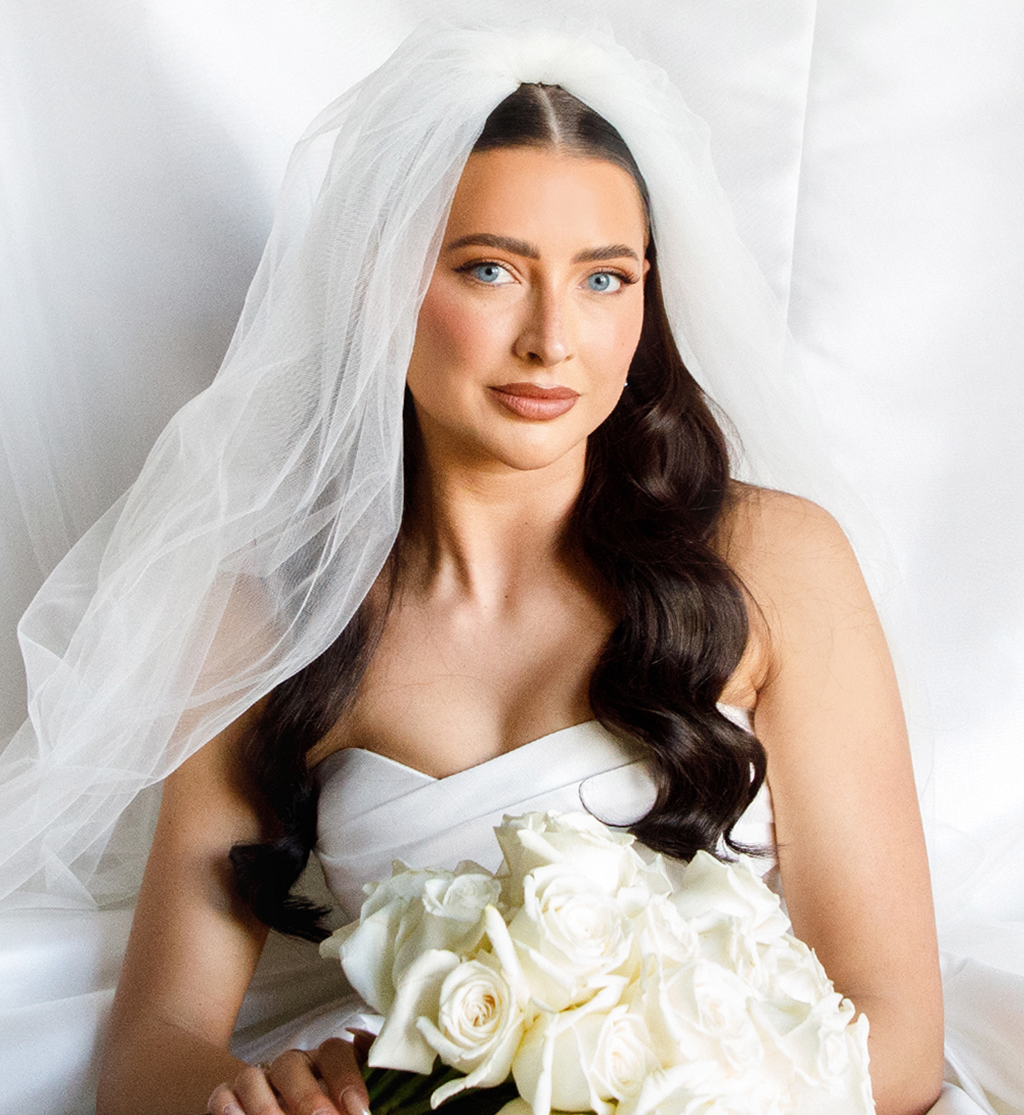 Bride holding white rose bouquet with veil at Cameron House wedding by Muse Styling