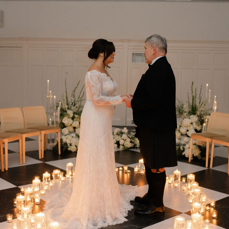 Luxury wedding ceremony styling with candle aisle hire and elegant floral arrangements by Muse Styling Scotland